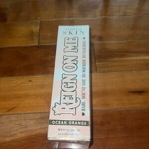 “Reign On Me” P. Louise ocean orange water spray NIB